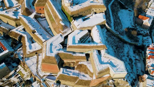 Fortress Klodzko and old town cityscape, aerial view. Famous historical landmark, fortification complex of the Lower Silesian Voivodeship. The biggest stronghold in Prussian Silesia. Winter panorama.