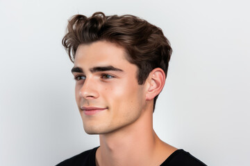 Beautiful model boy-man in a plain white studio, softly light. Suitable for diverse commercial projects