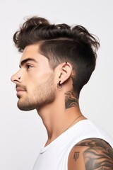 Fototapeta premium Beautiful model boy-man in a plain white studio, softly light. Suitable for diverse commercial projects