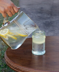 serving fresh lemonade in the garden
