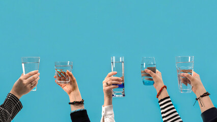 Obraz na płótnie Canvas women holding many glass of water