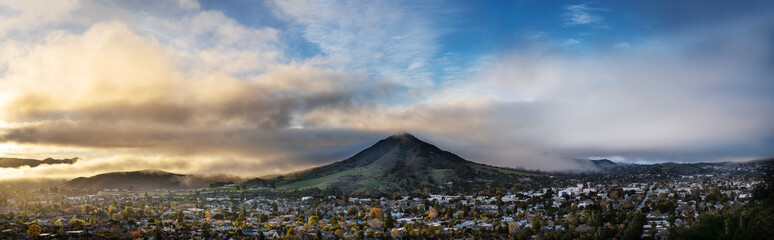 Panorama at sunset of mountain, town, city