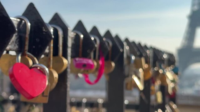 Paris, France, Eiffel Tower background, Valentine's day concept. Love locks attached to a bridge on the river Seine, Love symbols 