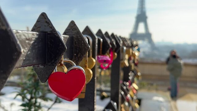 Paris, France, Eiffel Tower background, Valentine's day concept. Love locks attached to a bridge on the river Seine, Love symbols 