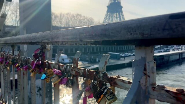 Paris, France, Eiffel Tower background, Valentine's day concept. Love locks attached to a bridge on the river Seine, Love symbols 