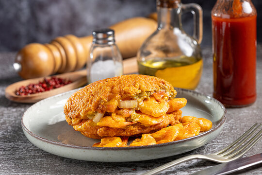 Acaraje. Traditional Brazilian food, made with vatap&aacute;, caruru and dried shrimp.