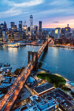 Aerial view of Brooklyn bridge and Manhattan at sunset, New York city, USA