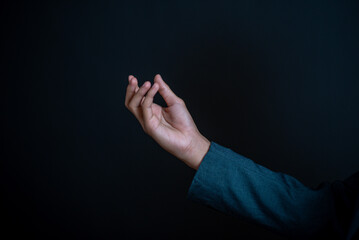 Businessman 's hand, fingers, conveying a powerful symbol of touch and connection in a conceptual...