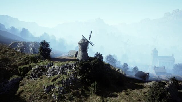 Countryside landscape with old windmill