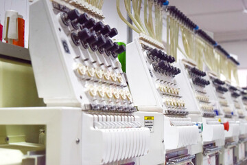 Industrial embroidery sewing machine for the textile industry