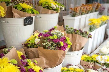 Fresh flowers shop. Flowers such chrysanthemum and daisies on display.