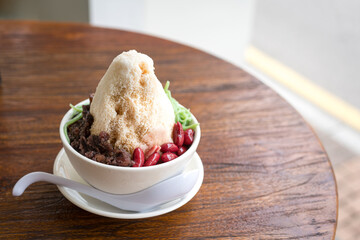 Sweet dessert Cendol, on wood table.