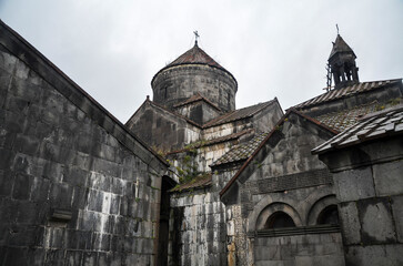 The gray walls of the Surb Nshan church, which is part of the medieval majestic religious complex...