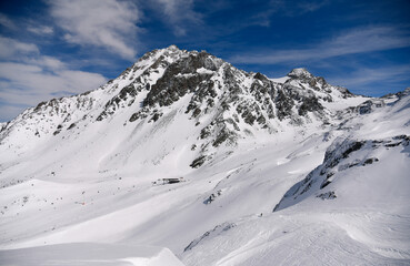 Fototapeta na wymiar Off piste skiing experience at the Thorens Glacier in Val Thorens ski resort, France. Breathtaking winter landscape view.