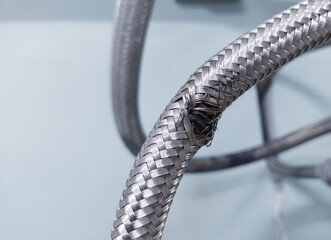 Example of flexible hose damage due to friction.