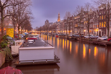 Amsterdam canal Keizersgracht with typical dutch houses at sunset, Holland, Netherlands.