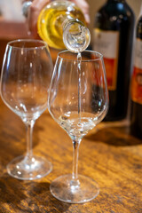 Tasting of sweet dessert Sauternes wines in old wine domain on Sauternes vineyards in Barsac village affected by Botrytis cinerea noble rot,  Bordeaux, France