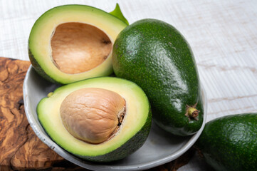 Green ripe avocado fruits from organic avocado plantation - healthy food