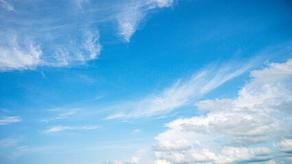 Naklejka na ściany i meble Summer blue sky with white clouds. Beauty clear clouds in sunshine.