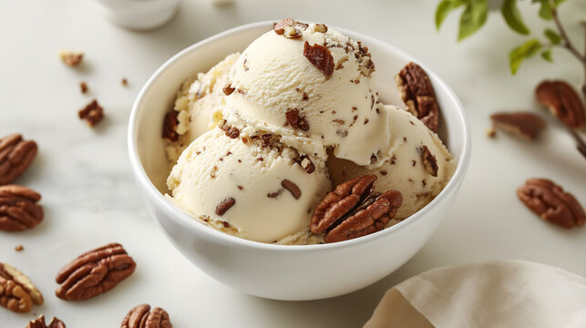 butter pecan ice cream in a white bowl