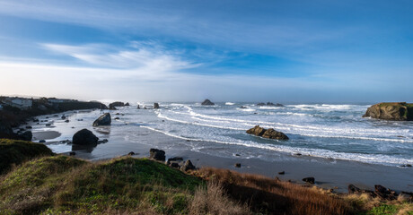 Ocean surf with big waves and sea stacks from cliff. Bandon Beach. Oregon. USA