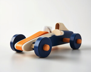 retro wooden toy racecar with blue, white and orange colors on a white background.
