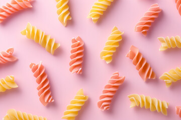 flat lay design with spiral pasta on a bright pink background, bold minimalism