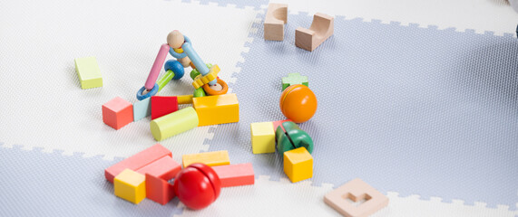 Colorful building blocks Banner with image of nursery school, etc.