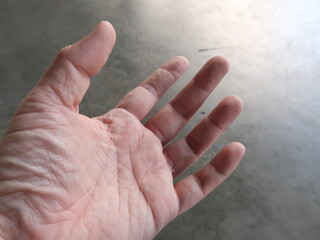 Closed up of left hand to pray.