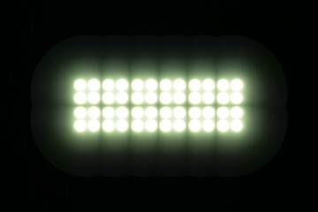 LED lights glowing in the dark with a blurred effect, suitable for technology backgrounds.