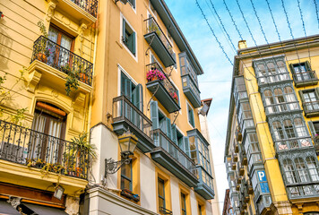Bilbao, Spain - January 2, 2024: Architectural details of typical buildings in and around Bilbao,...