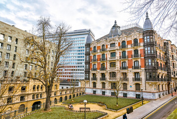 Bilbao, Spain - January 2, 2024: Torres Isozaki apartment buildings, designed by Arata Isozaki along the Nervion River in Bilbao, Spain
