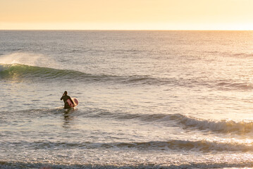 Fototapeta na wymiar Surfing, Campus Point, UCSB, Early Morning Light, California Surfing Culture