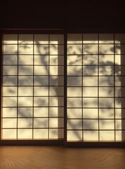 Tradition Japanese shoji paper window with shadow of trees casted on it
