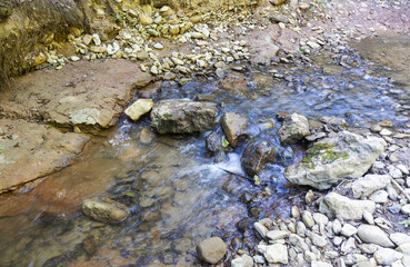 Morning on a mountain river, walking, awakening in nature summer sunny mood.