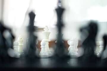 hand of businessmen moving chess in competition shows leadership, followers and business success...