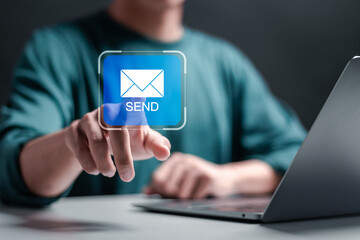 Marketing or newsletter concept, Businessman touching virtual Email icons for Send documents by...