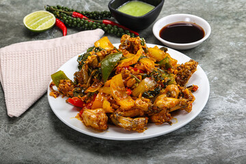 Vietnamese cuisine - fried frog with vegetables