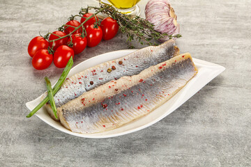 Marinated herring fillet with green onion