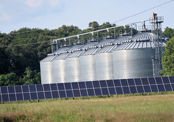 Farm Silos with Solar Power Panels along Roadside