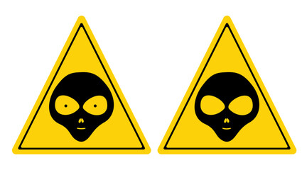 Obraz premium Aliens warning road sign, black and yellow isolated silhouette