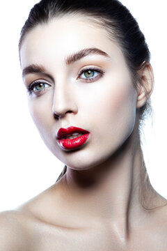 Beauty fashion portrait of caucasian brunette woman wet wet red lipstick