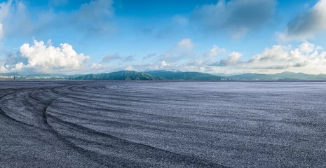 Keuken spatwand met foto Empty asphalt road and mountains with nature background © zhao dongfang