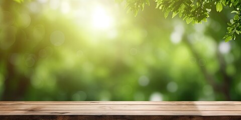 Blurry park with green trees, wooden table for food and product display against nature backdrop, with bokeh lights in spring and summer.