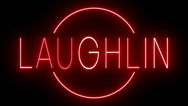Flickering red retro style neon sign glowing against a black background for LAUGHLIN