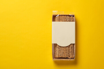 Crispy bread packaging on yellow background