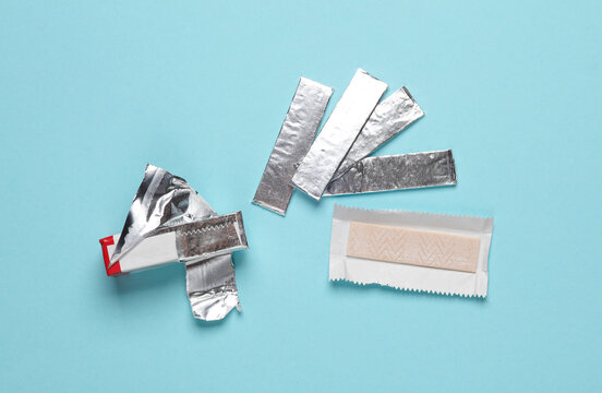 Chewing gum in foil on a blue background