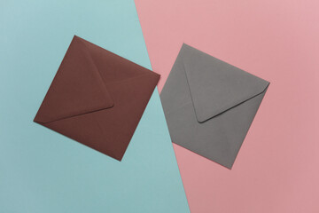 Envelopes on a blue-pink background