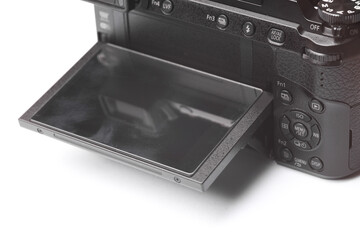 Flip screen of modern camera on white background