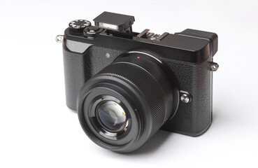 Modern mirrorless camera on white background